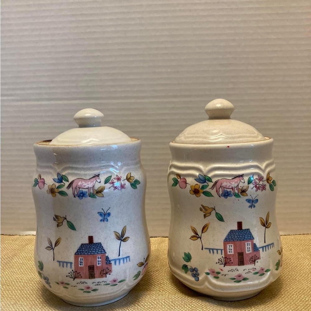 Two small Hartland canisters